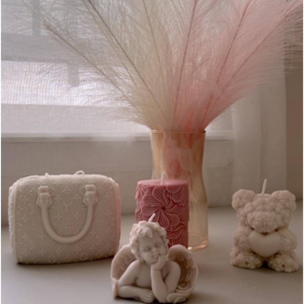Handcrafted sculptures, scented candles, and organic body products await you.